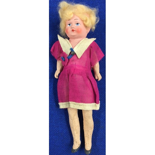 79 - A charming boxed doll from 1920's/30's.
Height 25cm