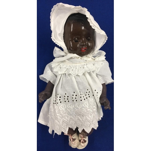 83 - A Black Doll c.1920-30.
Height 43cm