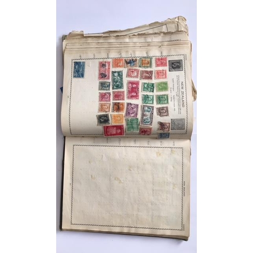 129 - A fabulous stamp album containing approximately 500 worldwide stamps. Most date from 1860s to 1930s.