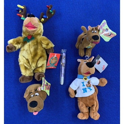 229 - Four Scooby-Doo soft toys, including Reindeer Scooby!, together with an unopened Scooby-Doo pen.