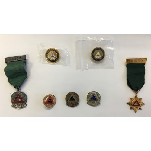 303 - A collection of 5 rare Enamel Safe Driving badges.
These were presented to HGV drivers with a safe d... 