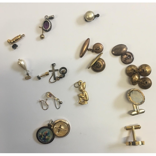 312 - A mixed lot of costume jewellery. Most are single cufflinks and single earrings