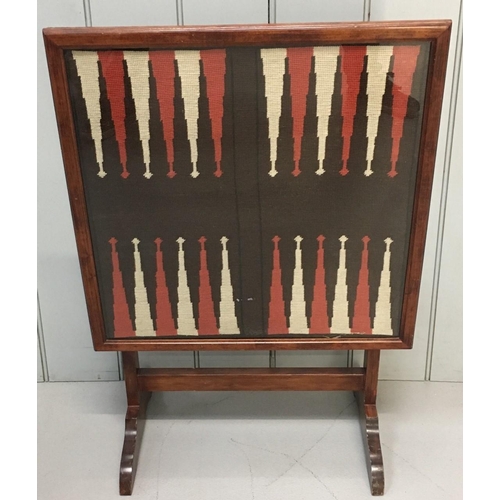 587 - A dual purpose Fire Screen/Backgammon Table.
Dimensions(cm) H74 W53 D30