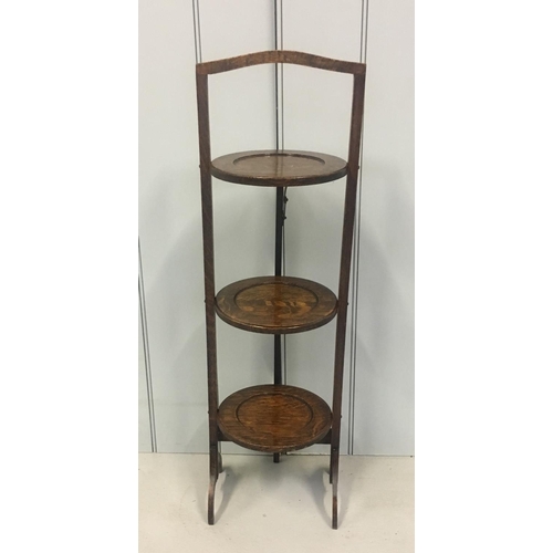 605 - A delightful 3-tiered folding cake stand.
Dimensions(cm) H85 W26 D24