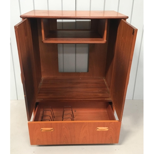 618 - A G-Plan Teak TV Cabinet. 2-door cupboard, over a single drawer. Drawer has dividers in place. Unit ... 