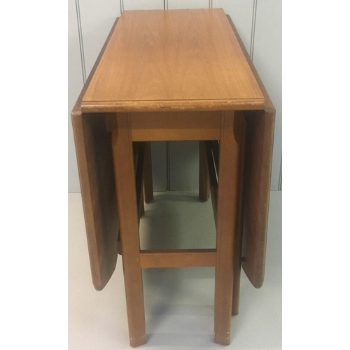 630 - A lovely mid-century gateleg extending teak table by 