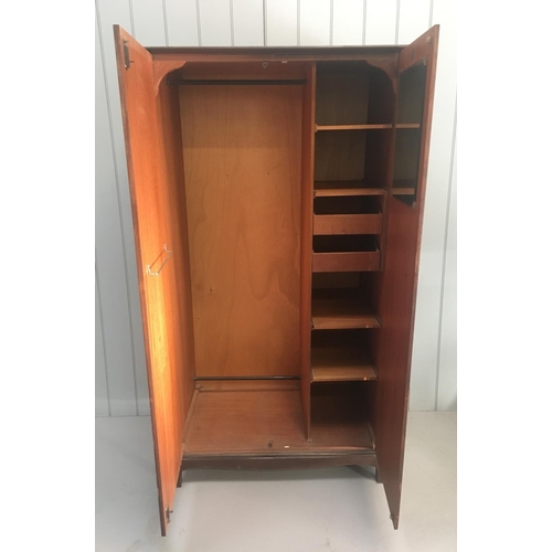 638 - A vintage Stag Minstrel S.156 compactum wardrobe. One hanging rail, a shoe rail and a tie/scarf rail... 