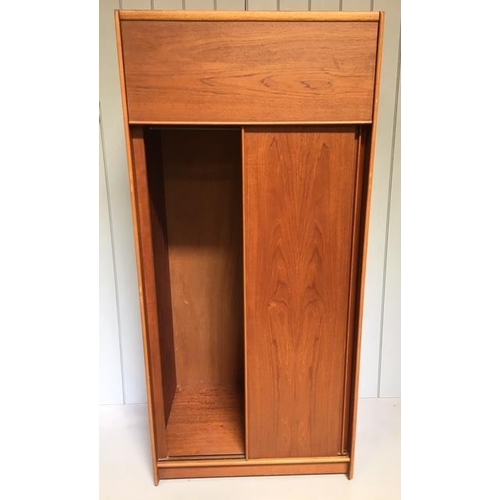 640 - A super mid-century Gents wardrobe by Austinsuite. Hinged top cupboard, over double sliding doors. I... 