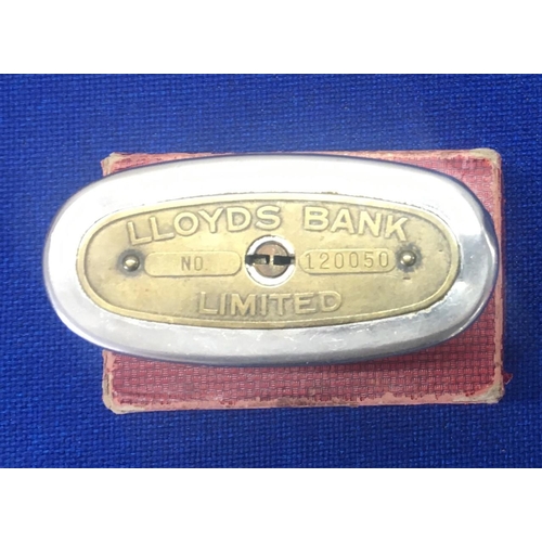 120 - A vintage Lloyds Bank moneybox, complete with outer box and key. No. 120050. Stainless Steel & Brass... 