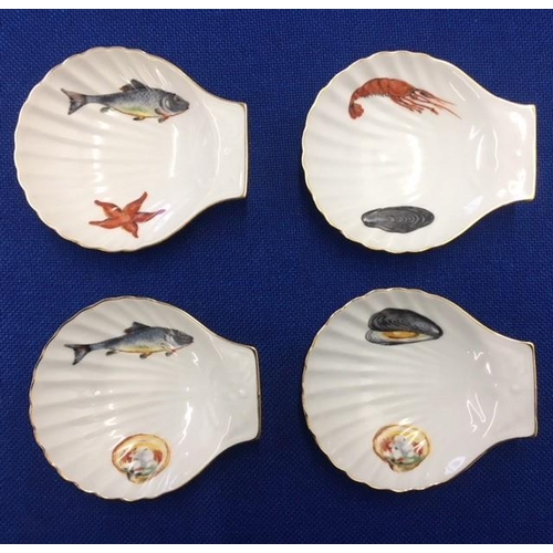 239 - A set of four French porcelain Apilco scalloped shell dishes.