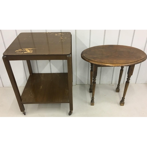 701 - A mixed lot consisting of an unusual vintage side table & a vintage veneered tea-trolley.
Dimensions... 