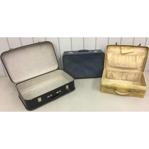 688 - A mixed lot of three vintage suitcases from 1950's-70's.
Two have keys present.