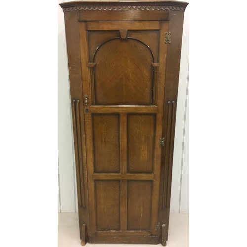 703 - An early 1900's oak wardrobe.
Single internal shelf, with internal mirror and hanging rail.
Dimensio... 