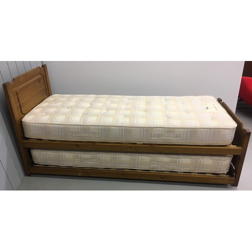 243 - A good quality Trundle bed by 