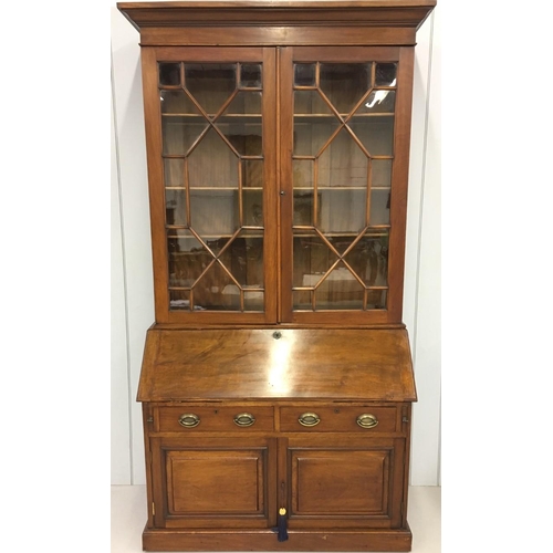 250 - 19th Century Tall Bureau Bookcase.
Bookcase has Astral glazed doors, with three internal shelves, ov... 