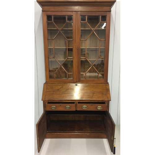 250 - 19th Century Tall Bureau Bookcase.
Bookcase has Astral glazed doors, with three internal shelves, ov... 