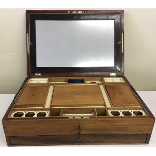 106 - A magnificent mid 19th century Anglo-Indian Rosewood & Ivory Sewing Box.
Incorporates many compartme... 