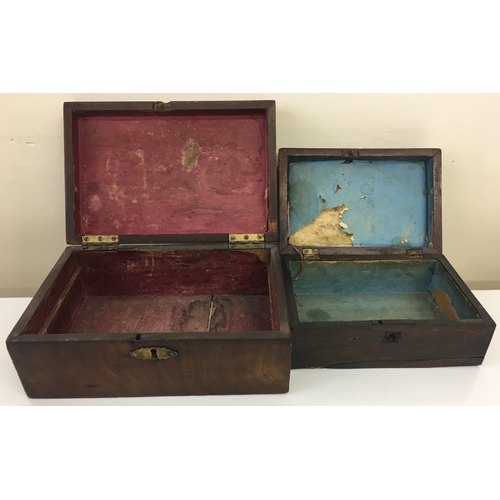 97 - A mixed lot of two Rosewood trinket boxes. The larger having no key present. The smaller has an inla... 