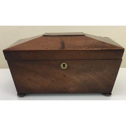 95 - A charming 19th century Tea Caddy. Sarcophagus shaped, with bun feet and brass lock/decoration. No m... 