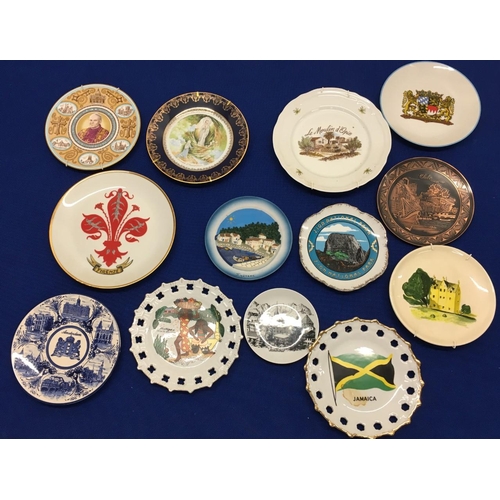 221 - A large collection of ceramic/souvenir plates from around the world. 26 in total.