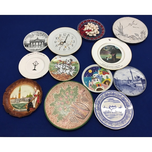 221 - A large collection of ceramic/souvenir plates from around the world. 26 in total.