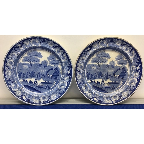 218 - A pair of 19th century willow pattern plates. English country scene.