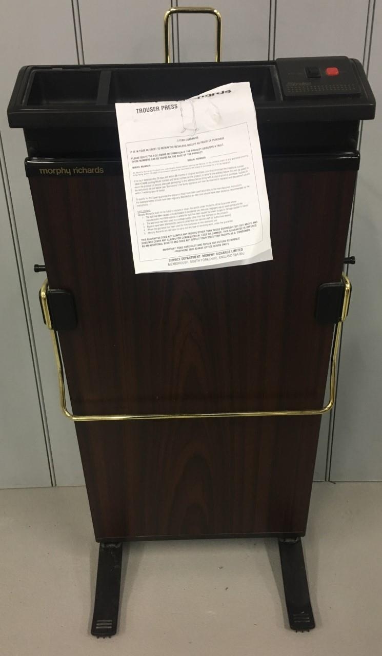 A Morphy Richards "Strides" trouser press, in mahogany colour. Complete