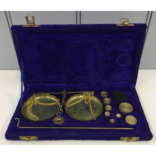 586 - A set of Brass Balance Scales, in Velvet presentation box.