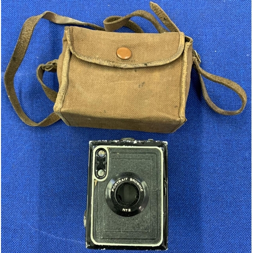 304 - A trio of vintage cameras including a Halina Super 8 Cine Camera, Ilford Sporti Camera and a Portrai... 