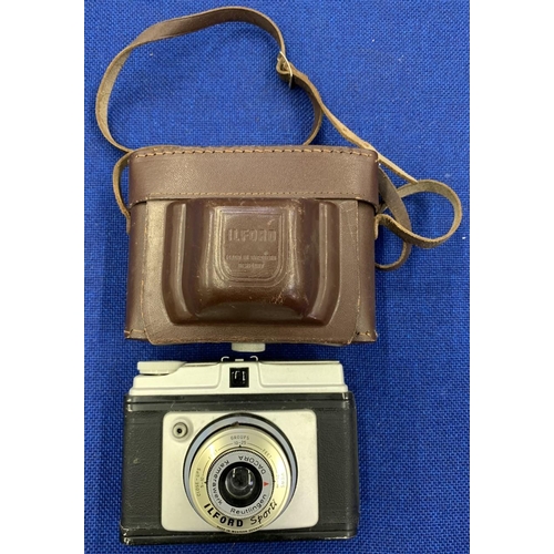 304 - A trio of vintage cameras including a Halina Super 8 Cine Camera, Ilford Sporti Camera and a Portrai... 