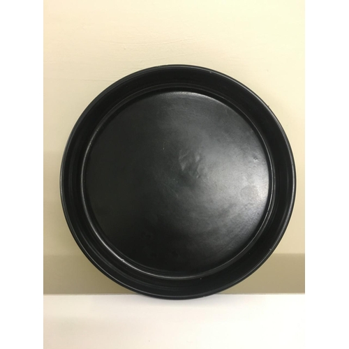 465 - A Wedgwood, black earthenware dish.
Diameter (21cm)