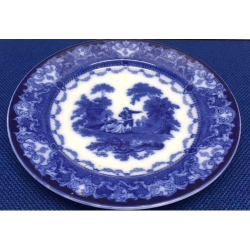 480 - A mixed lot of seven pieces of willow pattern ceramics. Includes Wedgwood, Doulton, Minton, Spode.