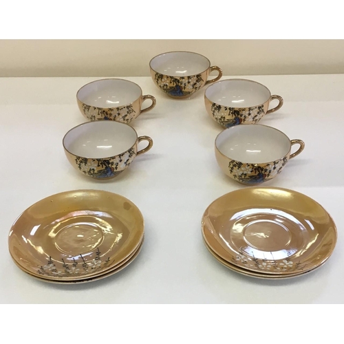 546 - A vintage, handpainted Japanese part-teaset.
Includes Cups(x5) & Saucers(x6)