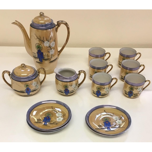 547 - A vintage Japanese Coffee Set.
Includes Coffee Pot, Milk Jug, Sugar Bowl, Cups(x6), Saucers (x5)