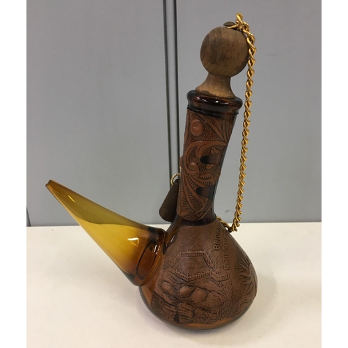 599 - Two vintage Spanish Porrons (large & small), together with a Spanish Sangria jug. All amber glass an... 