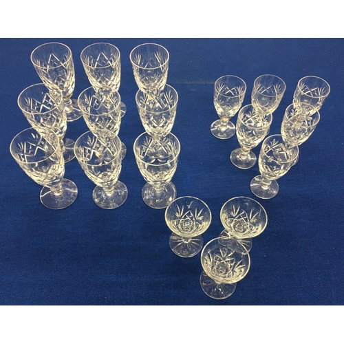 575 - A selection of quality crystal glasses by Royal Doulton.
Nine wine goblets, six short stem wine glas... 