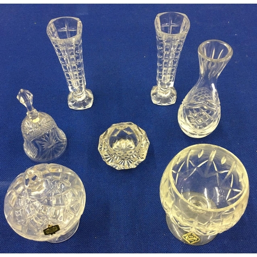 576 - A mixed lot of 7 items of crystal glassware. To include a Royal Brierley bowl, 3 short vases etc.