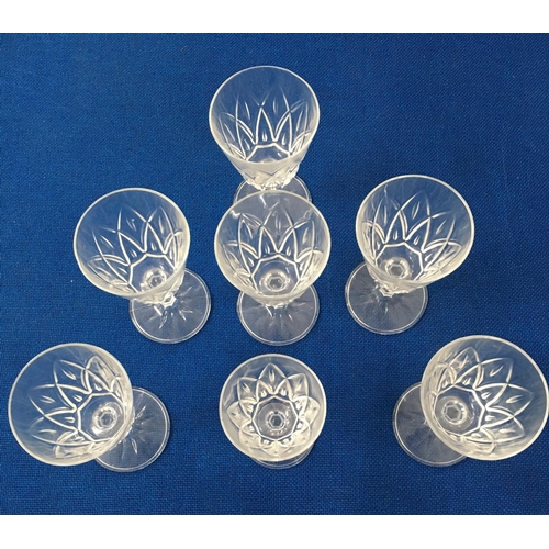 582 - A good assortment of sets & part-sets of primarily cut-glass wine glasses & tumblers.