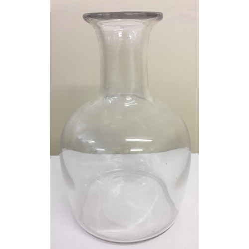 585 - A heavy glass carafe (probably Georgian), together with a Luigi Bormioli Italian decanter and anothe... 