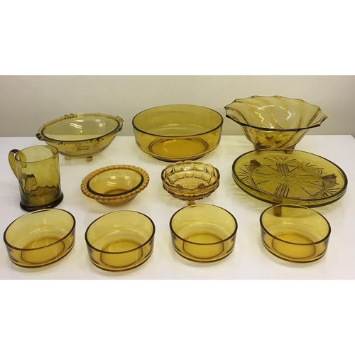 596 - A selection of eleven pieces of vintage Amber glass, mostly dining/kitchenware