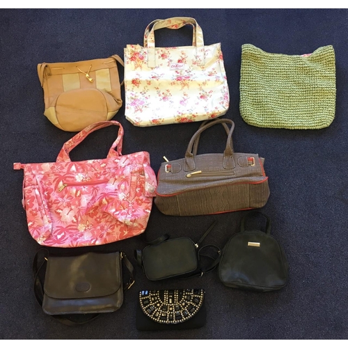 570 - A selection of nine vintage ladies handbags/bags.
Includes Cath Kidston, M&S etc.