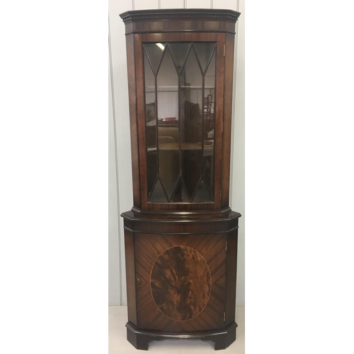 48 - A tall mahogany Corner Display Cabinet.
Edwardian-style glass door above bow-fronted cupboard. 
Dime... 