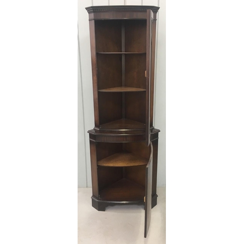 48 - A tall mahogany Corner Display Cabinet.
Edwardian-style glass door above bow-fronted cupboard. 
Dime... 