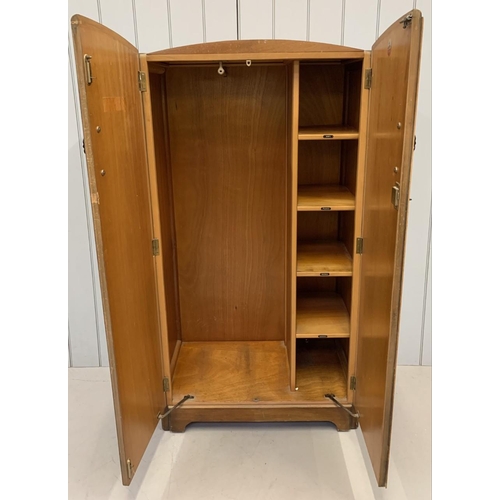 51 - An Art Deco veneered double wardrobe. Integrated shelves. Key present.
Dimensions(cm) H160, W84, D49... 