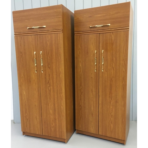 57 - A pair of veneered, freestanding Double Wardrobes. Both have single top cupboard, over double doors,... 