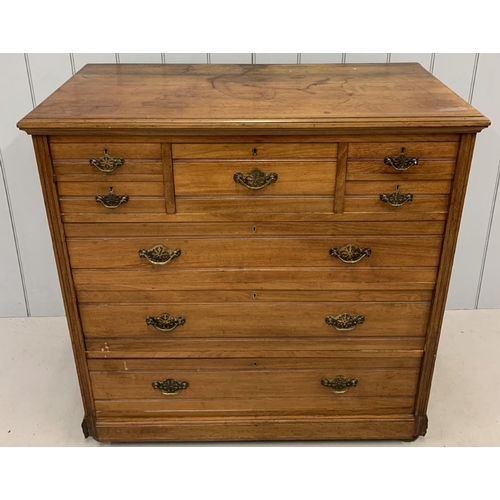 62 - A stunning, oak, Edwardian chest of drawers. Five over three drawers. Brass handles. No key present.... 