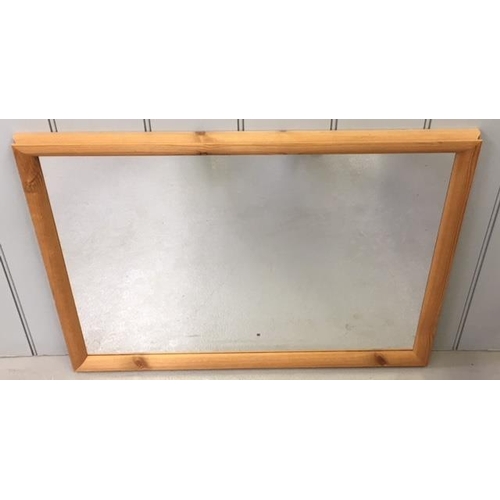 71 - A pine-framed Mirror. May be hung horizontally. Dimensions(cm) H50 W70