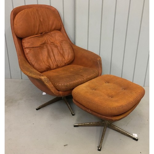 163C - A pair of mid-century leather egg chairs, upholstered in original orange leather. Chrome swivel base... 