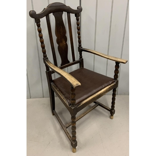 164E - An Edwardian, oak lounge chair. Barley-twist legs, brown leather seat.
Dimensions(cm) H110 (48 to se... 