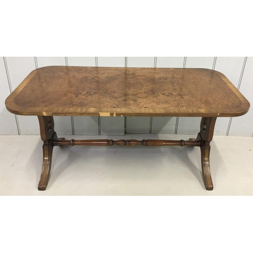 193 - A reproduction, veneered Coffee Table. Dimensions(cm) H44 W93 D45